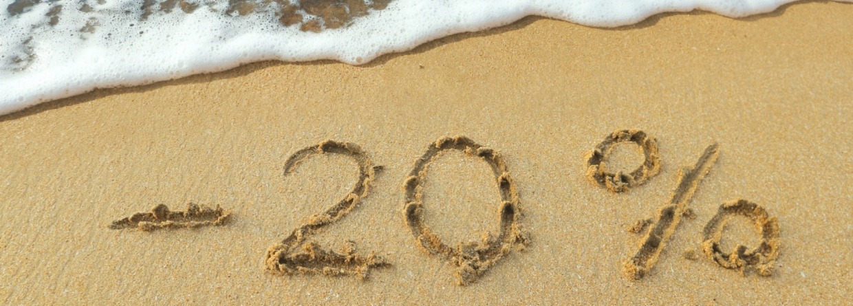 20 procent korting geschreven op het strand